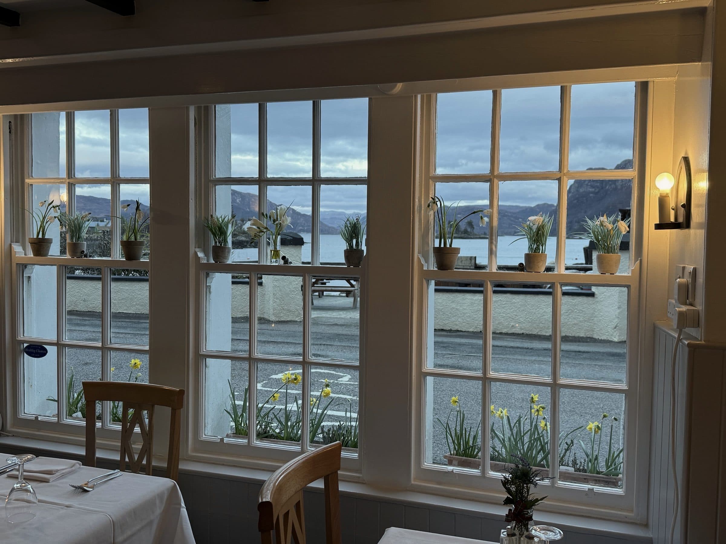 The dining room windows of The Plockton Hotel, looking out over the harbor