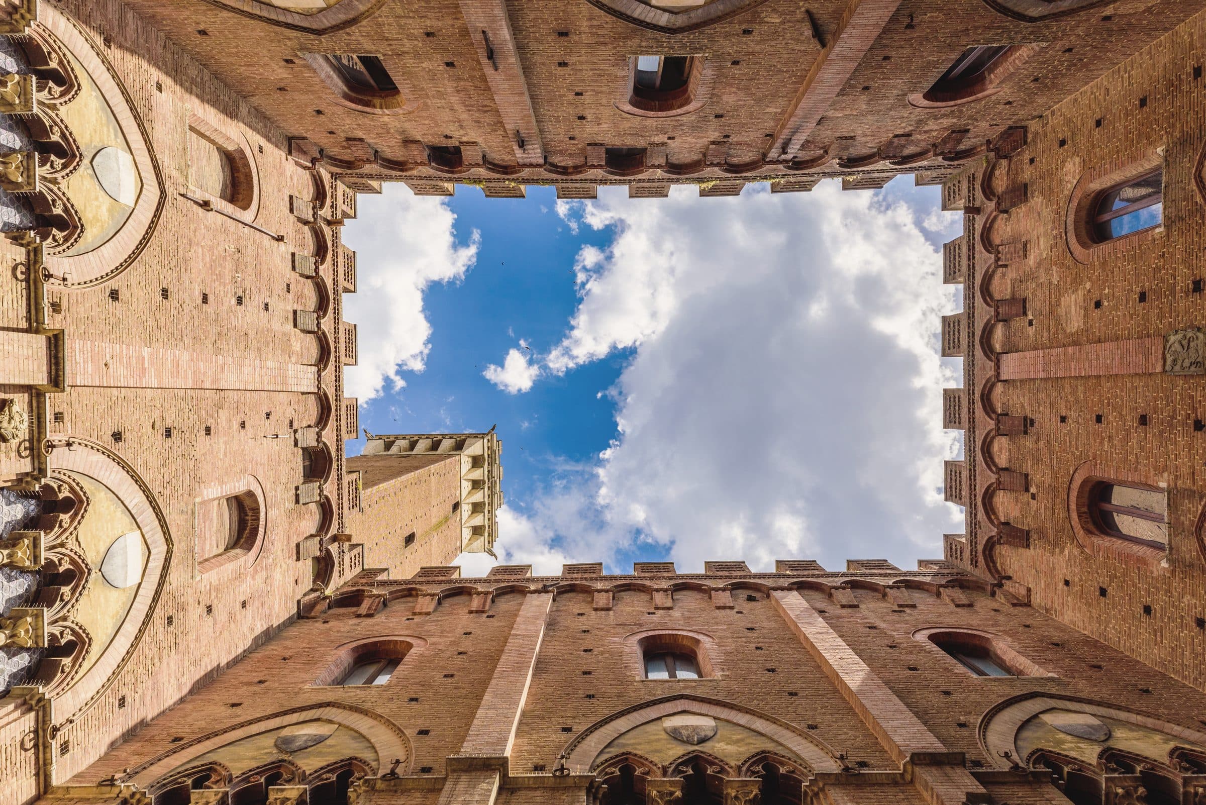 The sky framed by the courtyard of the Palazzo Pubblico, Siena